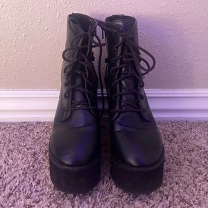 Black faux leather platform boots